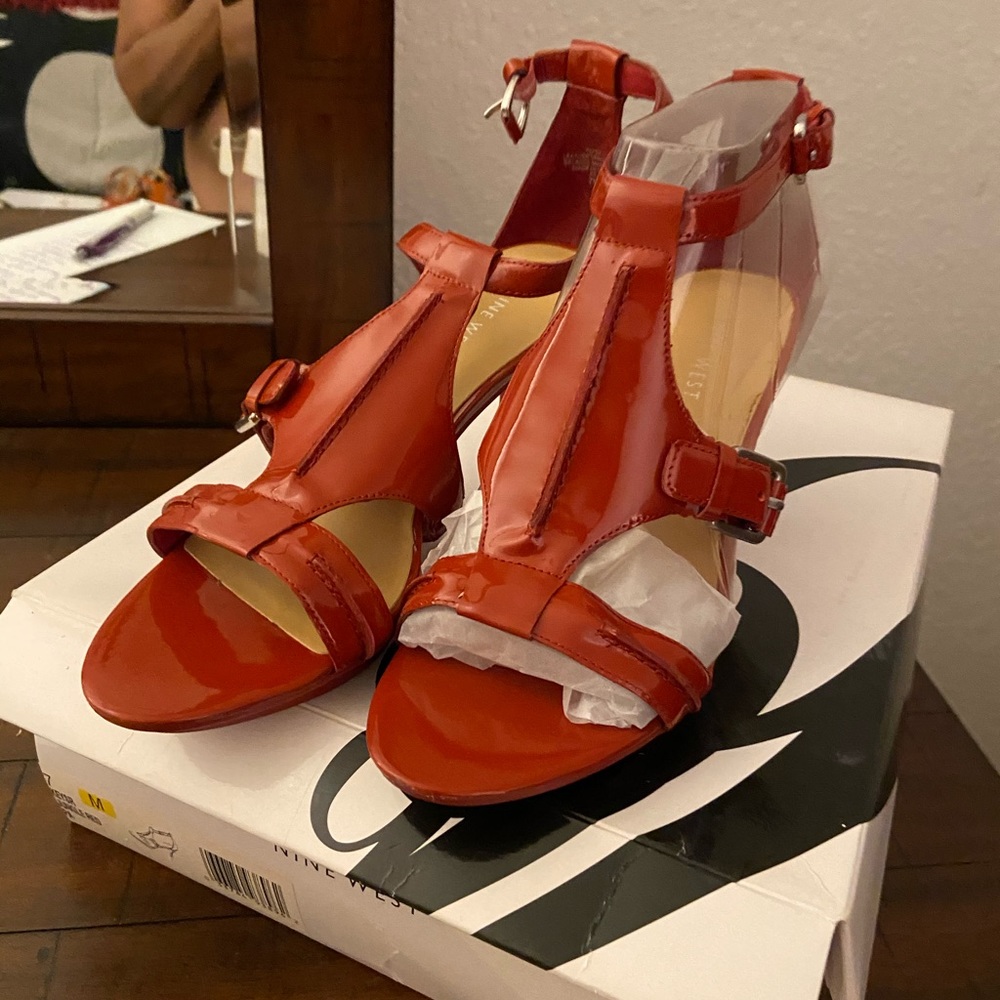 Orange Nine West shoe.